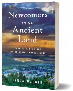 3D Book cover of Paula Wagner’s memoir “Newcomers in an Ancient Land,” featuring a sunset over the hills of northern Israel.