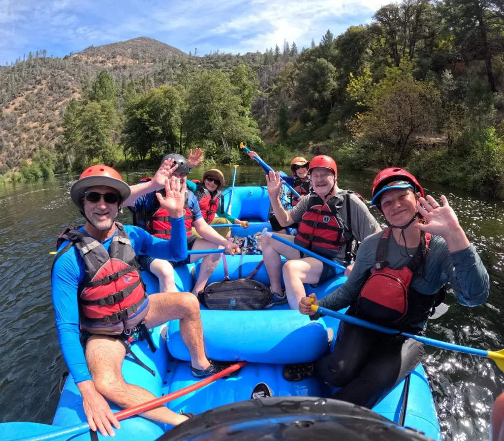 Paula Wagner's rafting crew relaxing on a quiet stretch of the Middle Fork of the American River, summer 2026